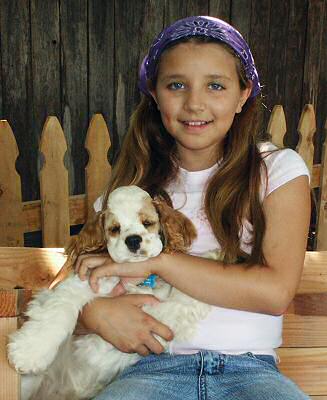 two cuties...  and one is a Cocker Spaniel