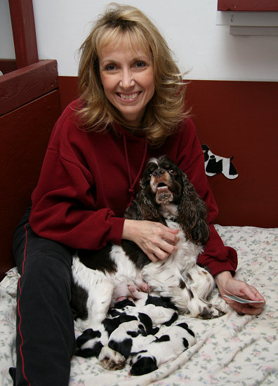 Kellyn with Reese and the puppies