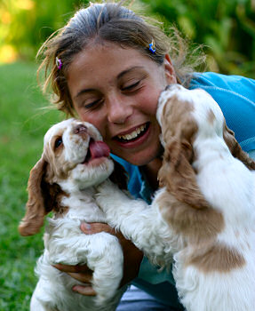 Playing with the neighbor kids is excellent for the pups